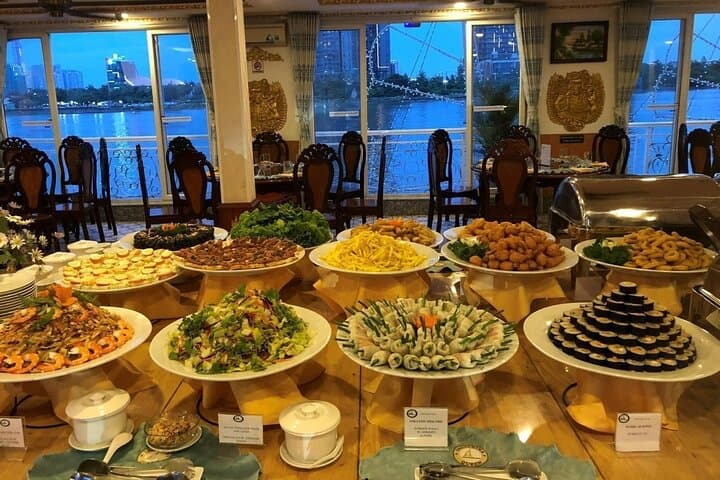 Evening Water Puppet Show and Saigon River Dinner Cruise with Cyclo Transfer photo 3