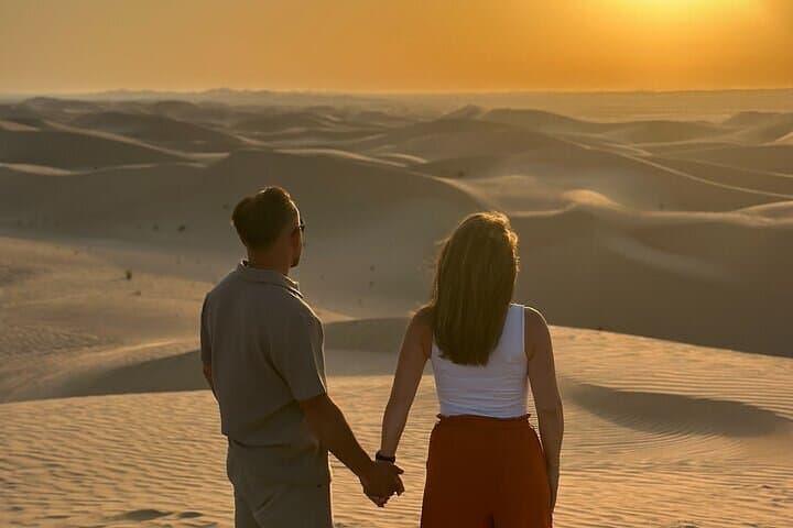 Abu Dhabi Desert Sunrise Safari: Dune Bashing, Camel Ride & Sunrise Photography photo 1