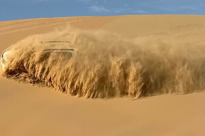 Abu Dhabi Morning Desert Safari — Dune Bashing, Camel Ride & Sandboarding