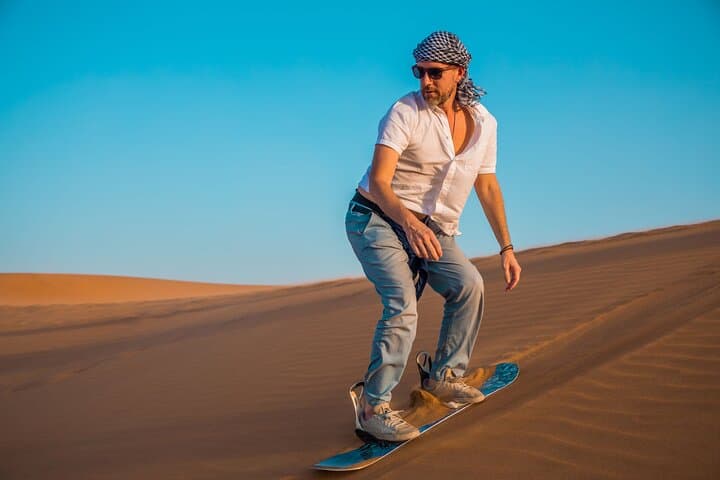 Abu Dhabi Desert Safari: Evening Dune Bashing, Camel Ride & BBQ Experience photo 2