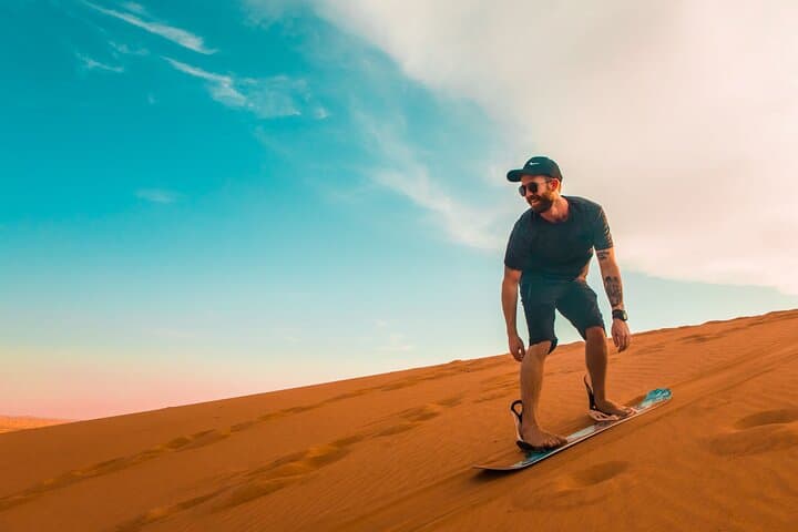 Abu Dhabi Morning Desert Safari: Dune Bashing, Sandboarding & Camel Ride photo 2
