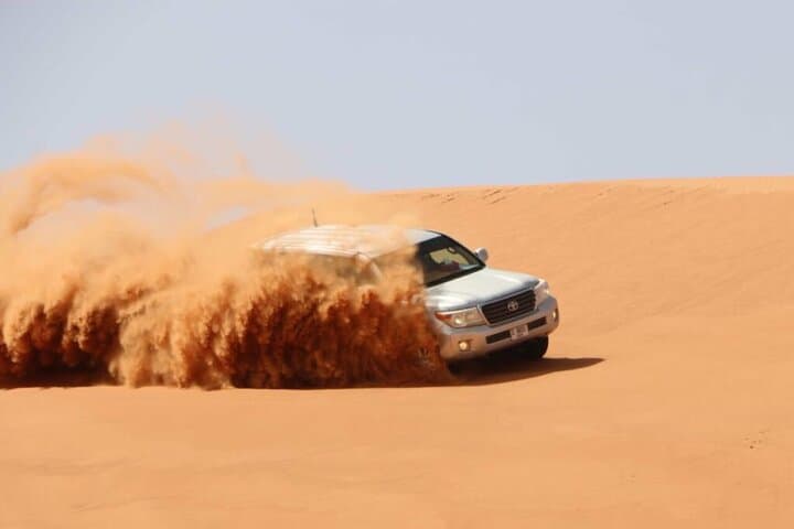 Qatar Private Desert Safari: 4-Hour Sunrise Dune Bashing & Sandboarding