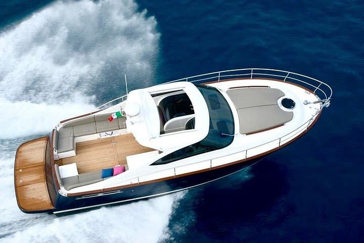 Capri Private Boat Tour: Blue Grotto, Faraglioni & Coastal Swimming from Positano photo 4