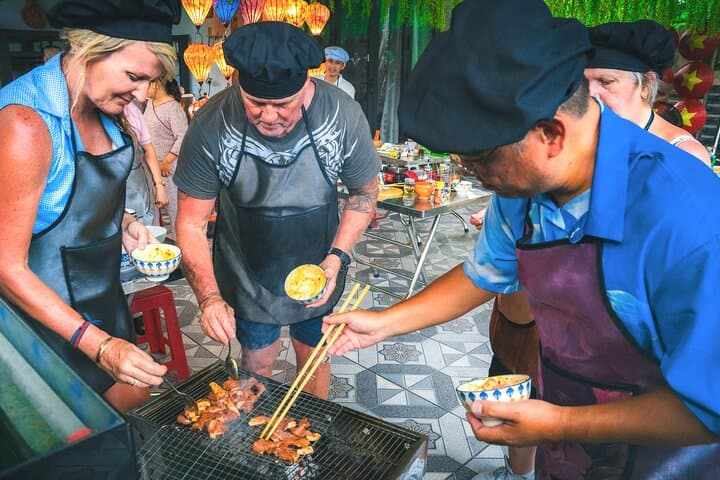 Marble Mountain Adventure with Vietnamese Cooking Class and Han River Night Cruise