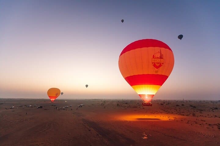 Dawn Desert Balloon Ride Over Dubai: Falcon Flights, Breakfast & Dune Views