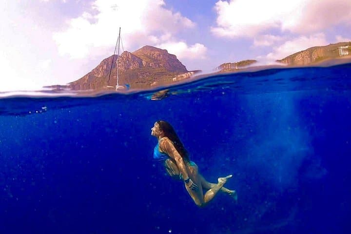 Capri Private Boat Tour: Blue Grotto, Faraglioni & Coastal Swimming from Positano photo 2