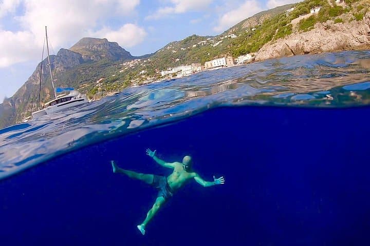 Capri Private Boat Tour: Blue Grotto, Faraglioni & Coastal Swimming from Positano photo 3