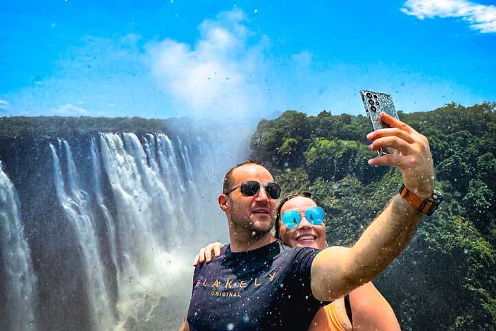 Guided Tour of Victoria Falls — Best Viewpoints, Rainforest Walk & Local Insights photo 6
