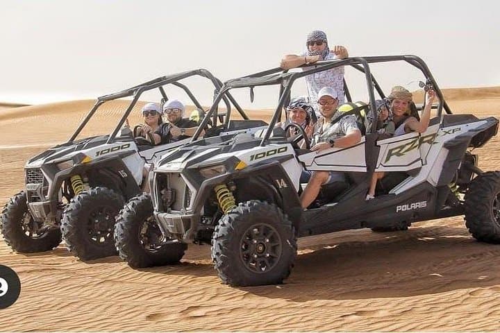 30-Minute Dubai Quad Biking Self-Drive: Red Dunes Adventure with Sandboarding & Camel Ride photo 3