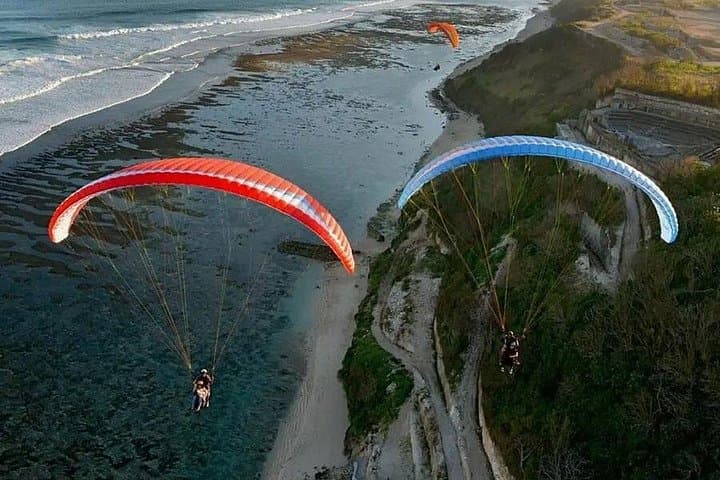 Tandem Paragliding Over Nusa Dua: 15-Minute Cliff Flights Above Bali's Indian Ocean photo 1