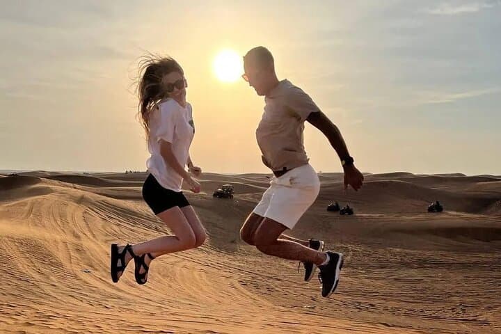 Dubai Evening Desert Safari: Dune Bashing, BBQ & Live Shows at Sunset photo 2