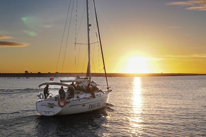 Sunset Sail on the Douro: Charming 2-Hour Porto Sailboat Cruise