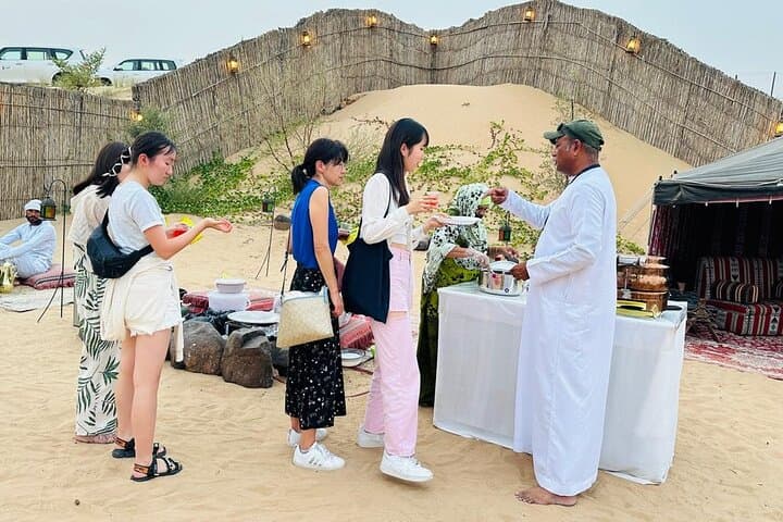 Sunset Dunes: Private Dubai Desert Safari with BBQ, Sandboarding & Camel Ride photo 2