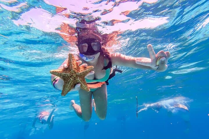 Luxury Catamaran to Isla Mujeres from Puerto Morelos — Snorkel, Ice Bar & Sunset Sail photo 4