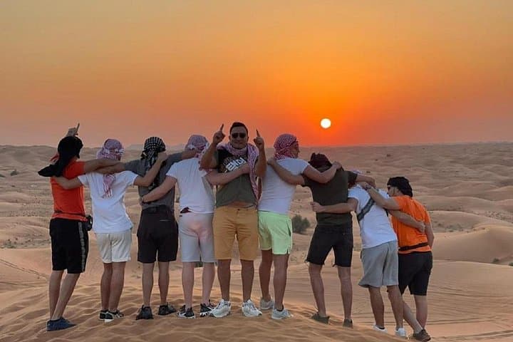 Evening Desert Safari Dubai: Quad Bike, BBQ & Bedouin Camp Experience photo 2
