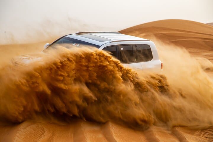Al Lahbab Sunset Desert Dinner: Camp, Camel Rides & Live Shows