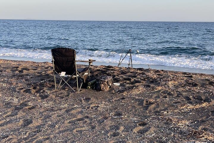 Monolithos Volcanic-Beach Fishing: Santorini Sunset Rod & Swim Experience photo 2