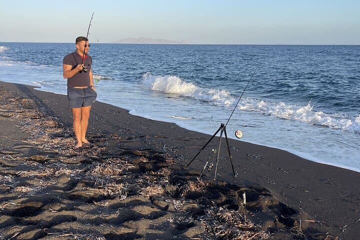 Monolithos Volcanic-Beach Fishing: Santorini Sunset Rod & Swim Experience photo 3