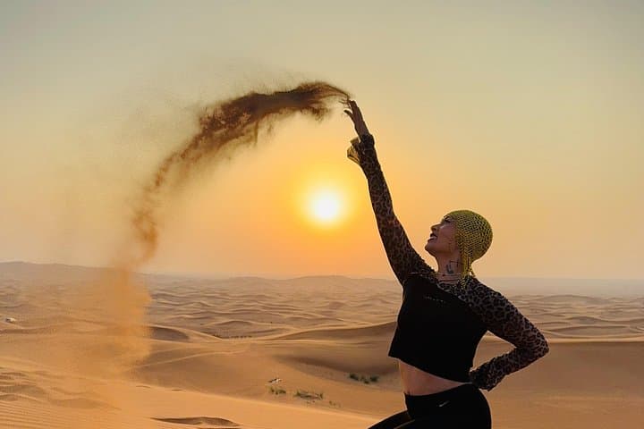 Lehbab Red Dunes Desert Safari: Dune Bashing, Sandboarding & Bedouin Camp