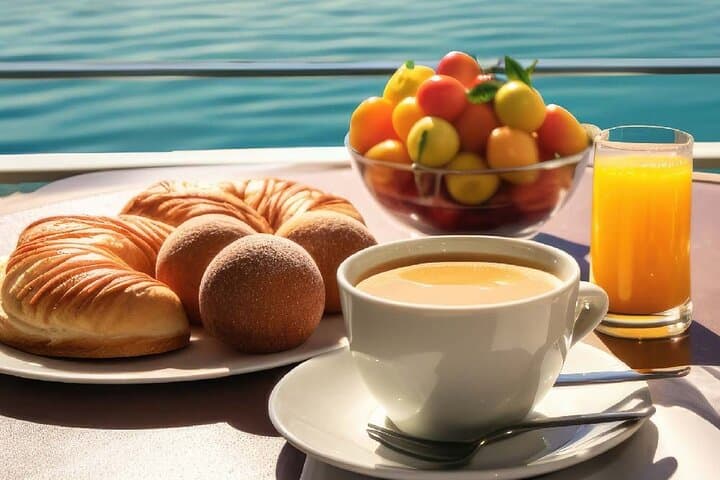 Sunrise Dolphins & Breakfast: Private Taormina Coast Boat Tour photo 2