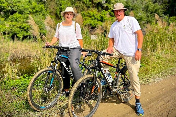 Private Day Trip to Ninh Binh: Tam Coc Boat, Hoa Lu Temples & Village Cycling photo 1