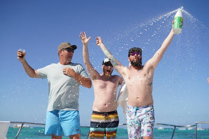 Boots and Booze Punta Cana Country Party Boat Cruise — Snorkel, Natural Pool & Live Country Vibes
