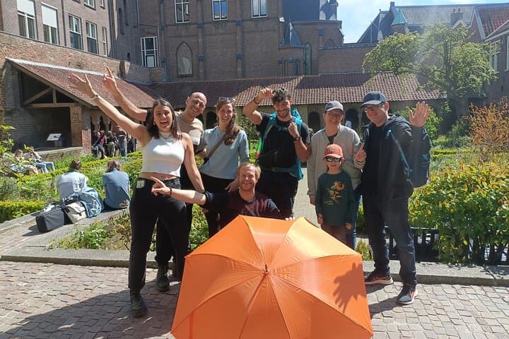 Utrecht Private Walking Tour: Dom Tower, Hidden Gardens & Canal-Level Wharves