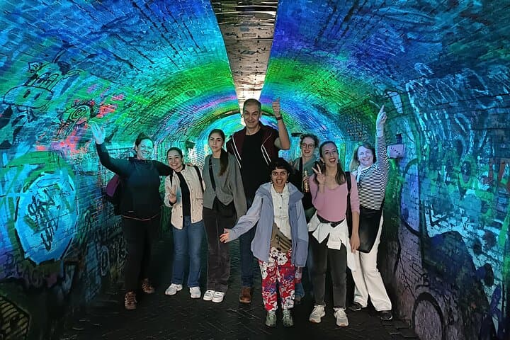 Utrecht Private Walking Tour: Dom Tower, Hidden Gardens & Canal-Level Wharves photo 2