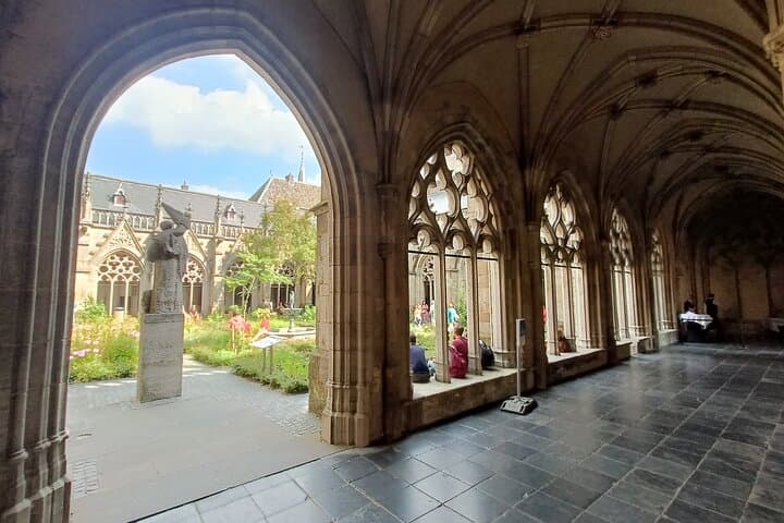 Utrecht Private Walking Tour: Dom Tower, Hidden Gardens & Canal-Level Wharves photo 3