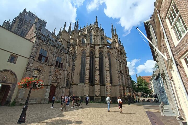 Utrecht Private Walking Tour: Dom Tower, Hidden Gardens & Canal-Level Wharves photo 4