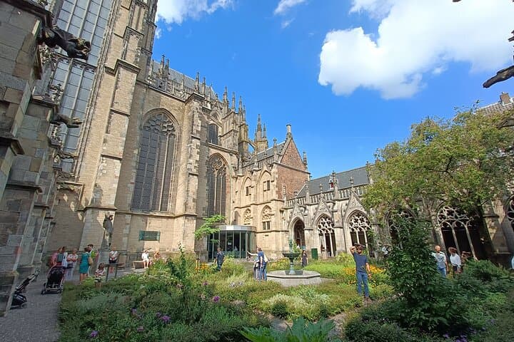 Utrecht Private Walking Tour: Dom Tower, Hidden Gardens & Canal-Level Wharves photo 5