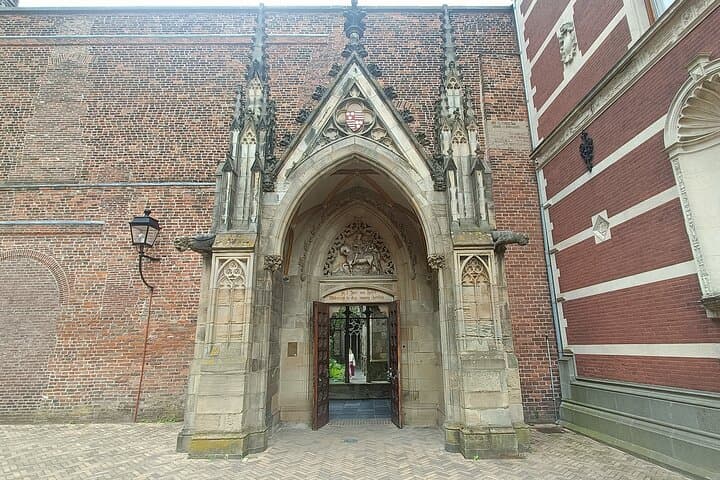 Utrecht Private Walking Tour: Dom Tower, Hidden Gardens & Canal-Level Wharves photo 6