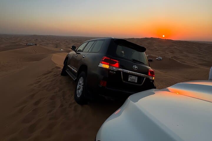 VIP Sunset Red Dune Safari in Dubai — Camel Ride, Dune Bashing & BBQ Dinner