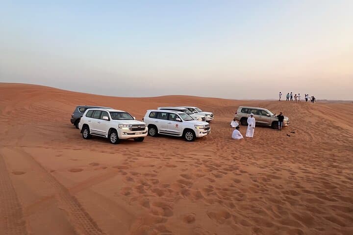 Dubai Evening Red Sand Safari: Dune Bashing, Camel Ride, Sandboarding & BBQ photo 3