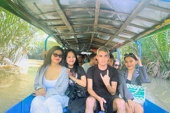 Mekong Delta Day Tour from Ho Chi Minh City — Boats, Villages & Vĩnh Tràng Pagoda photo 5