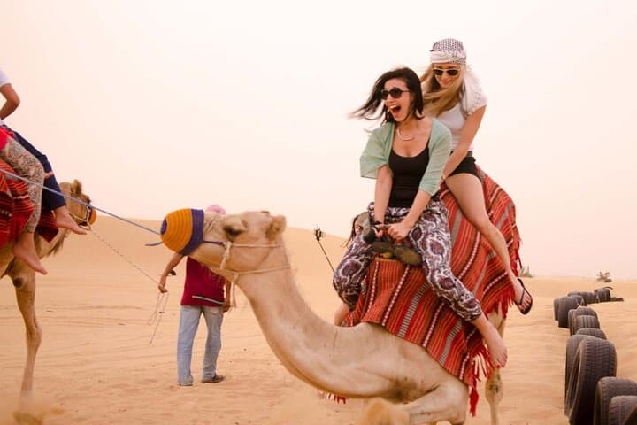 Dubai Red Dunes Safari: ATV, Camel Ride & 5-Star Desert BBQ Experience photo 5