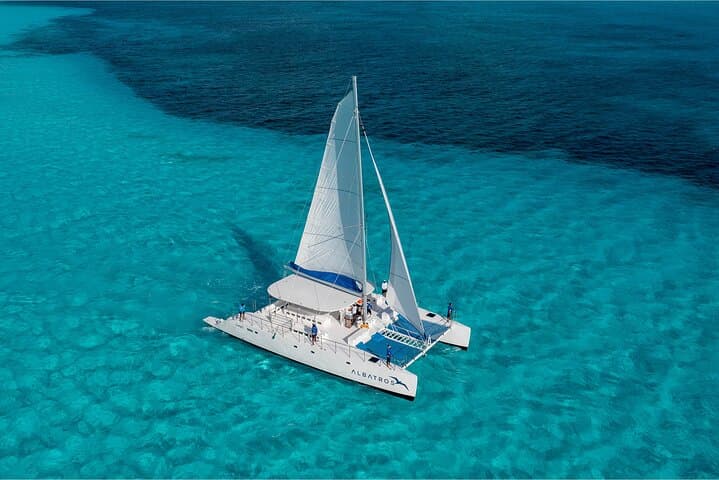 Hip-Hop Catamaran Party from Cancun to Isla Mujeres — Snorkel, Sandbank & Beach Club Fiesta photo 3