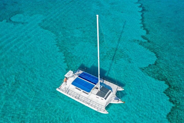 Hip-Hop Catamaran Party from Cancun to Isla Mujeres — Snorkel, Sandbank & Beach Club Fiesta photo 6