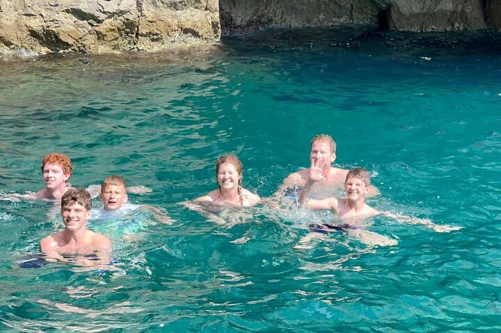 Capri Catamaran Private Boat Tour: Blue Grotto, Faraglioni & Hidden Coves photo 5