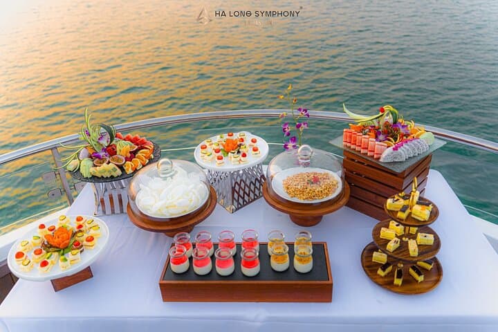 Day Cruise Through Ha Long Bay: Symphony 5-Star Tour to Sung Sot Cave & Titov Island photo 3