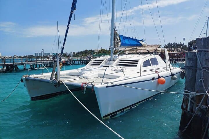 Private Catamaran Party to Isla Mujeres — Snorkel, Beach Club & Open Bar photo 2