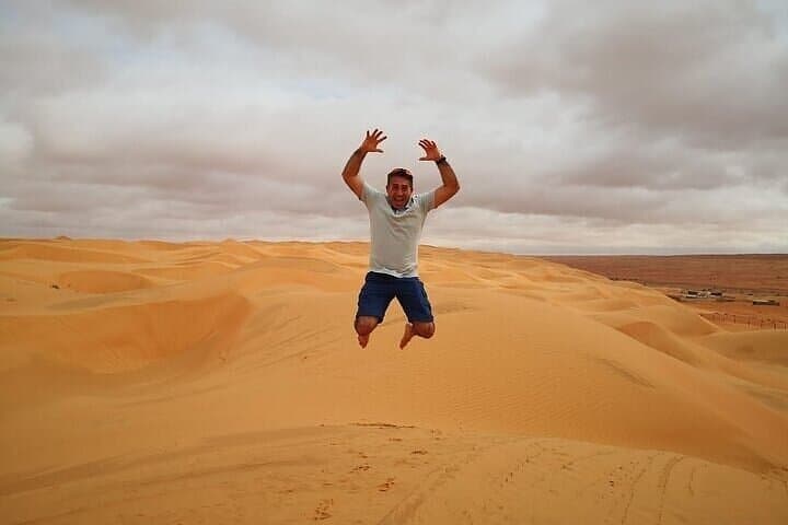 Red Dunes Lahbab Desert Safari — Dune Bashing, Sandboarding & BBQ in Dubai photo 4