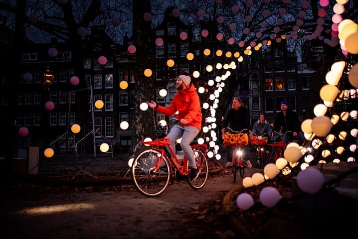 Amsterdam Evening Lights Bike Tour: Guided 90-Min Canal Ride