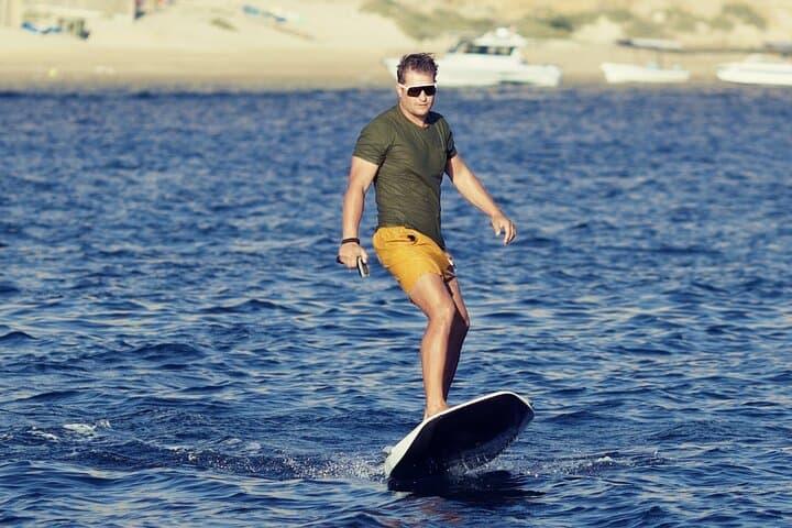 E‑Foil Surfing in Muscat Bay — Glide Above Arabian Waters at Sunrise photo 1
