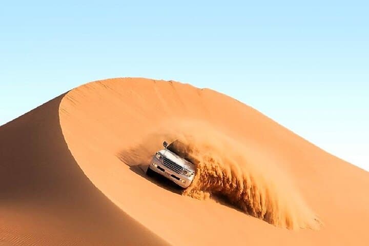 Red Dunes Safari: Camel Rides, Dune Bashing & BBQ Under Desert Stars photo 3