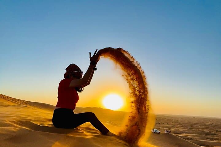 Morning Red Dunes Desert Safari: Camel Ride, Dune Bashing & Sandboarding in Dubai photo 1