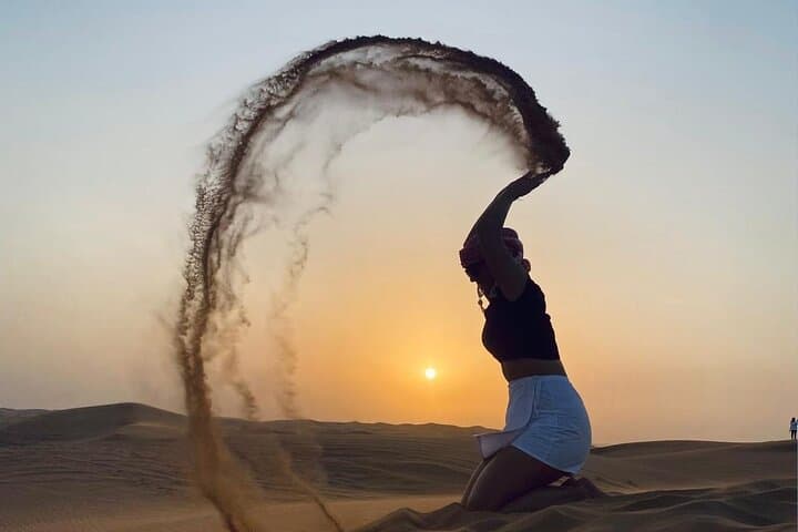 Red Dune Dubai Desert Safari: Sandboarding, Camel Rides & Night Camp Experience photo 6