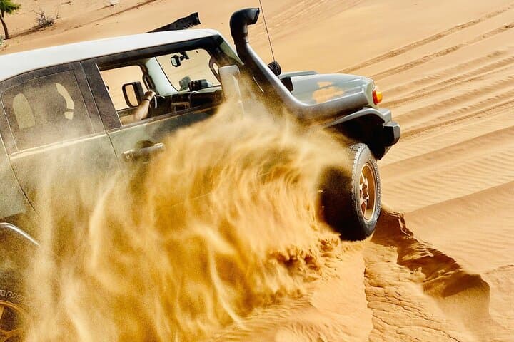 Private Sunrise Desert Safari in Dubai — Dune Bashing, Camel Ride & Breakfast photo 4
