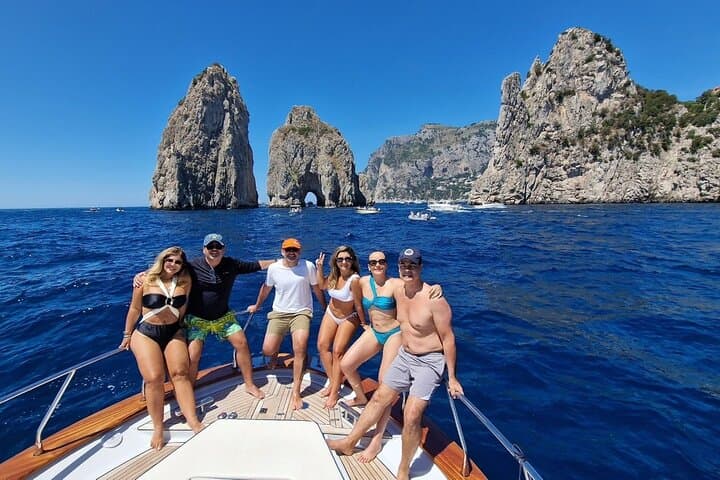 Capri Two-Hour Boat Tour — Grottoes, Faraglioni & Swim Stop photo 4