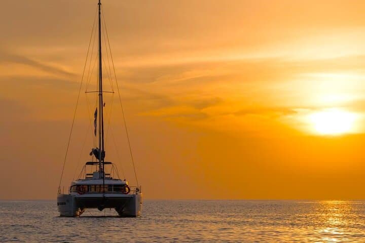Sunset Catamaran Cruise to Kleftiko Bay, Milos — Dinner, Snorkel & SUP photo 4